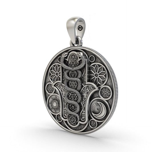 Close-up oxidized 925 silver chakra pendant detailing
